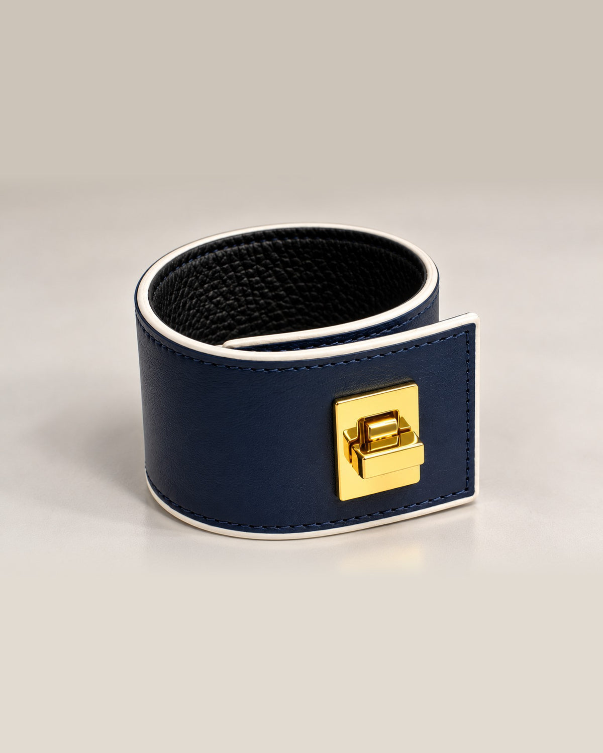 L'Élégante, navy leather with white edges