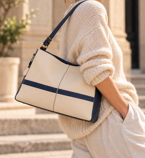 Allure handbag, cream leather with navy band