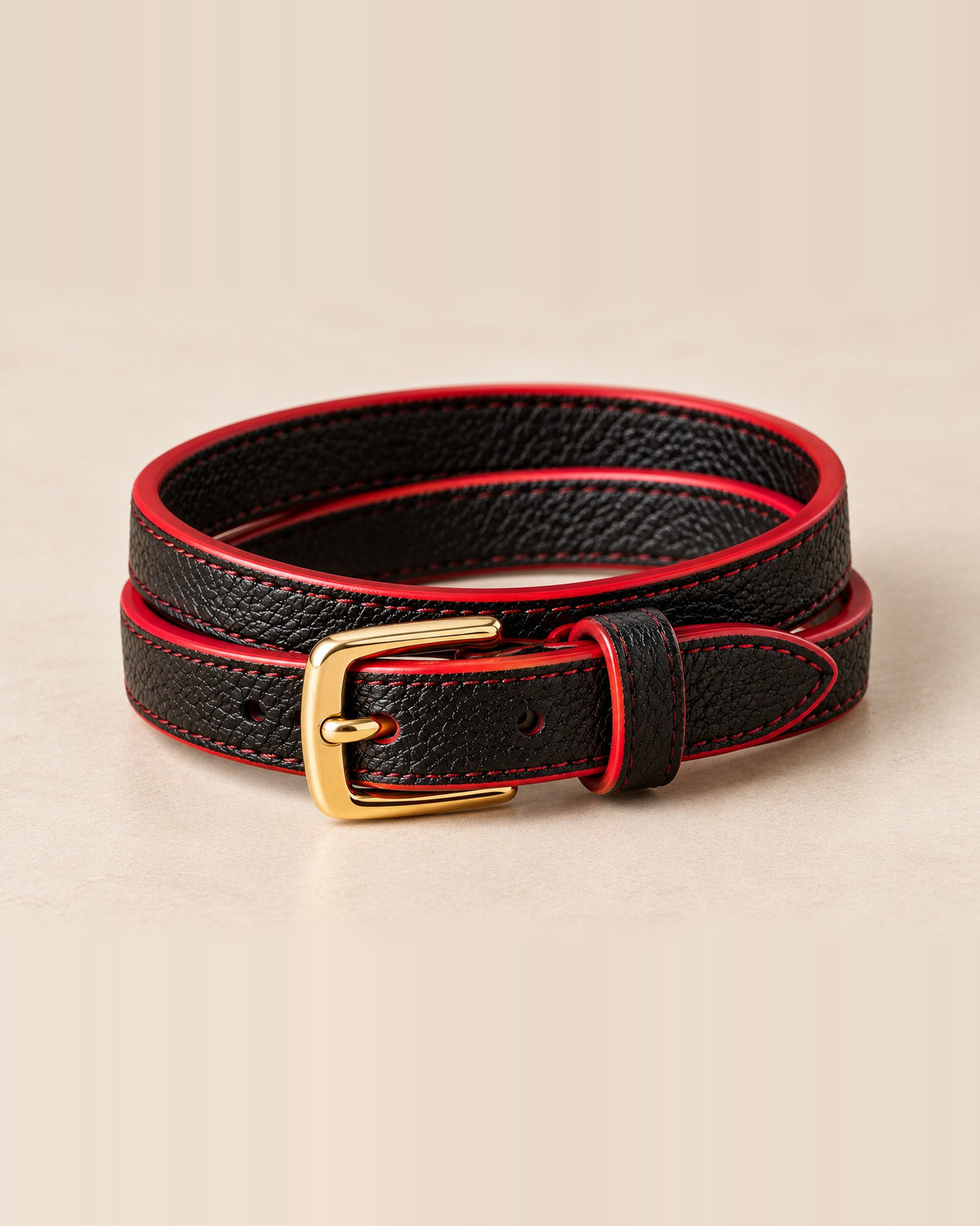 La Pétillante, black leather with red edges