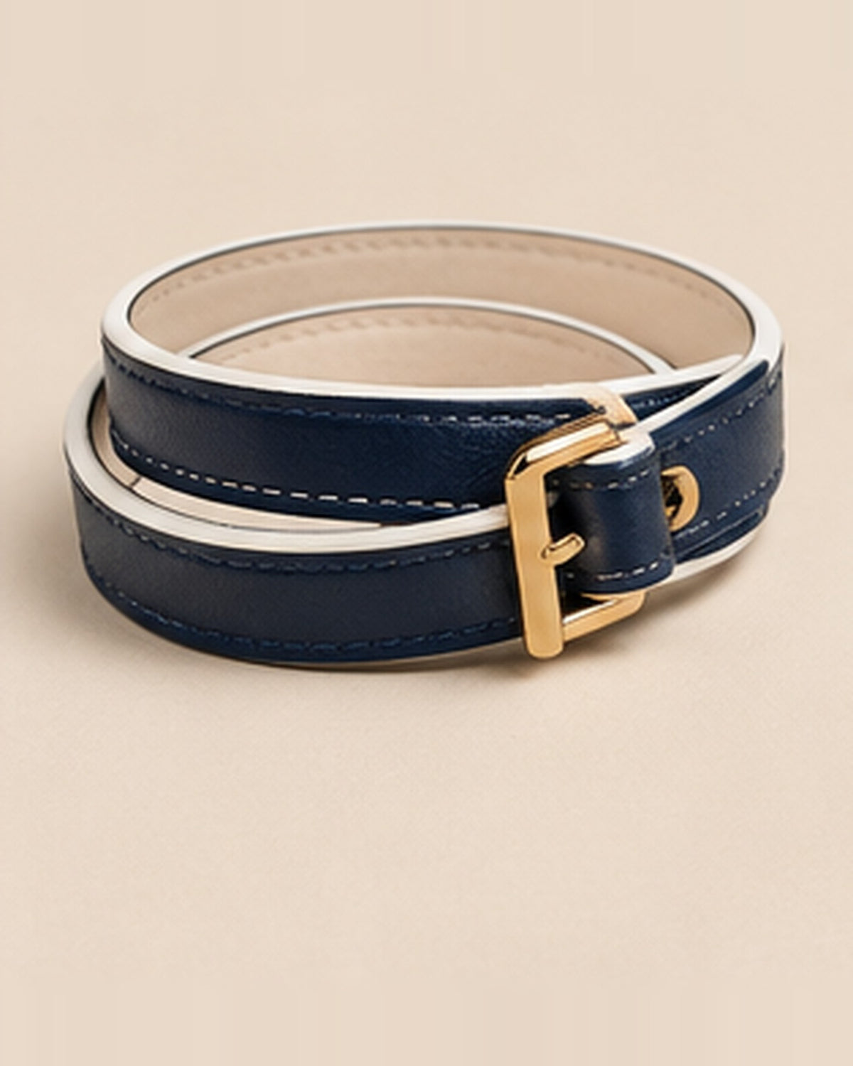 La Pétillante, navy leather with white edges