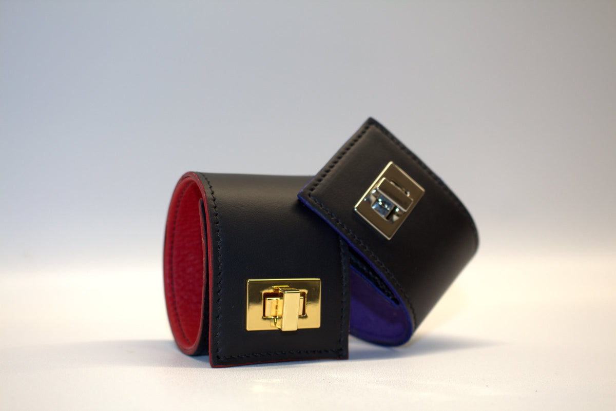 Stylish cuffs: red lining with gold lock, purple lining with silver lock